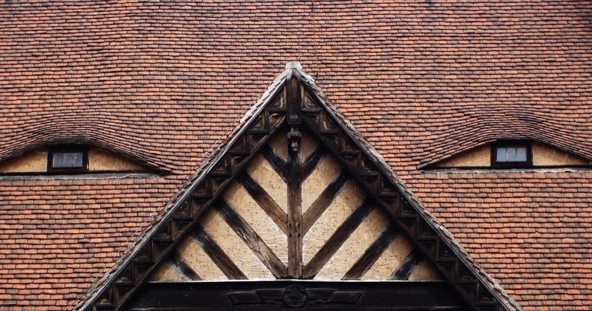 A house with windows and door arranged like a face